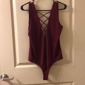 Dee red body suit